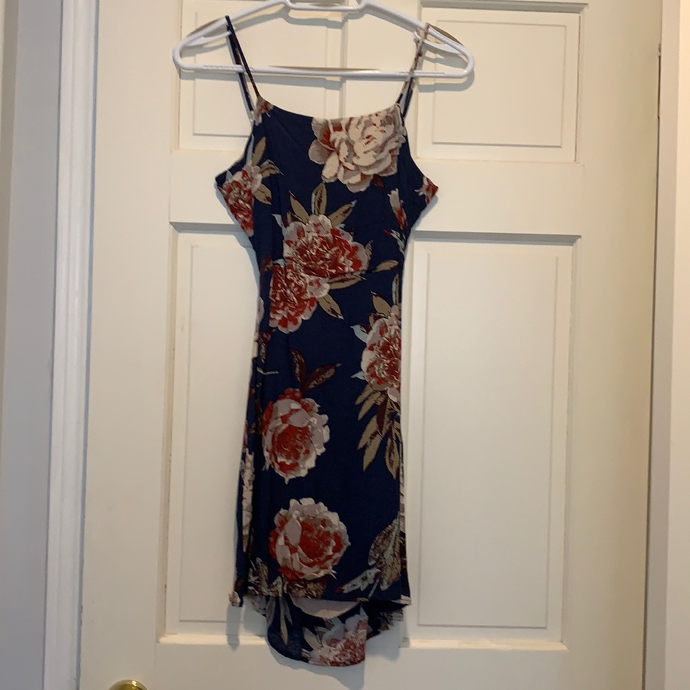Short spaghetti strap dress with cut out back